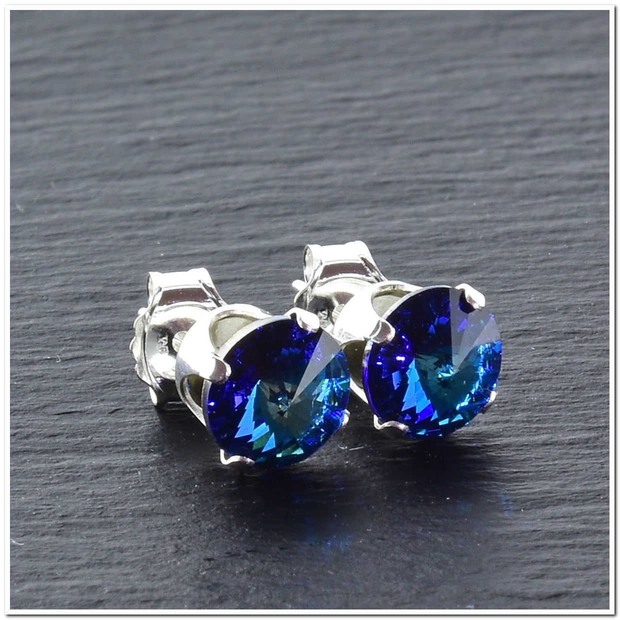 pewterhooter® Women's Classic Collection 925 Sterling silver earrings with brilliant Bermuda Blue crystals, packaged in a gift box for any occasion.